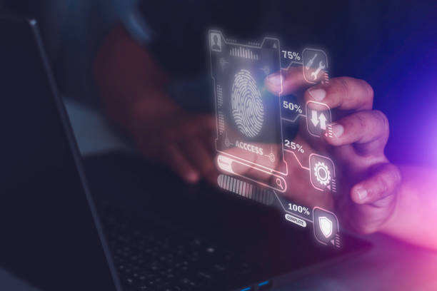istock Businessman using laptop computer protecting business and financial data with virtual graphic 1409687516