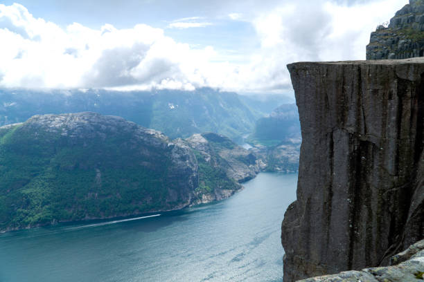 Views of Preikestollen and Lysefjord on a cloudy day Views of Preikestollen and Lysefjord on a cloudy day lysefjorden stock pictures, royalty-free photos & images