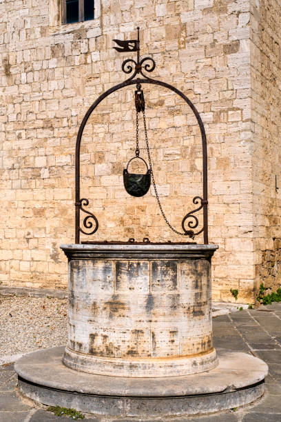 Medieval well in San Quirico d'Orcia