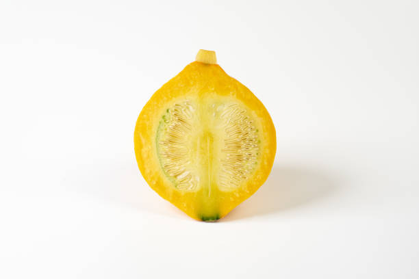 istock round yellow pumpkin on white background 1409692968