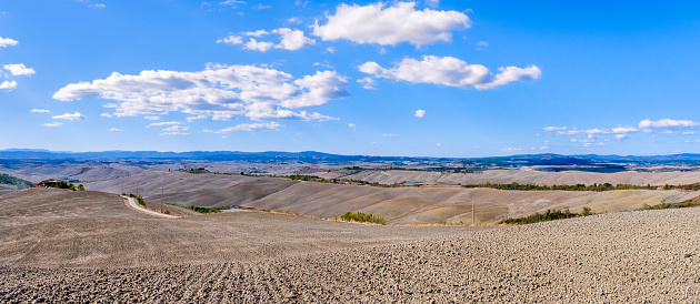 Crete Senesi in the province of Siena, a territory characterized by barren and gently undulating hills (2 shots stitched)