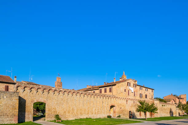 Buonconvento Surrounding Walls - Tuscany Fourteenth-century walls surrounding the town of Buonconvento crete senesi stock pictures, royalty-free photos & images