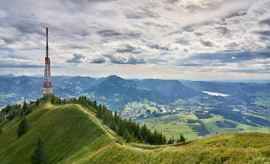 panoramic landscape view from Mount Gruenten  over the summits of the Allgaeu alps and Iller valley near Immenstadt, Bavaria, Germany