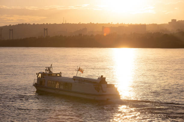 istock Cruise boat at dawn on the river 1409702312