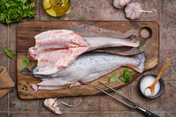 istock Fish with aromatic herbs and spices. 1409702584