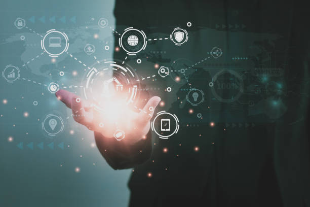 istock Engineer holding digital network icon,control automated robot arm machine in factory,machine learning operation,concept business and industry 4.0,artificial intelligence or AI 5G network technology 1409712113