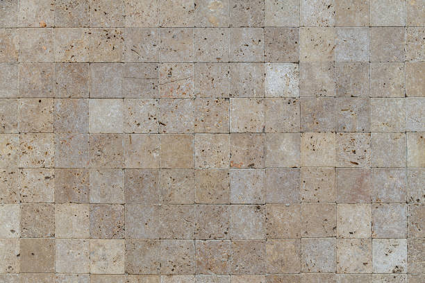 istock Yellow stone tiles masonry closeup background 1409716774