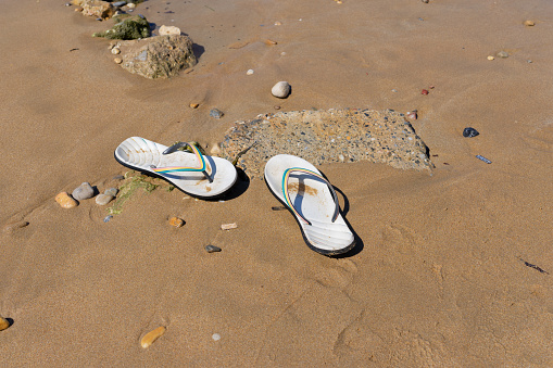 Shallow footprints on a beach on a volcanic island, Spain, Atlantic ocean, volcanic rocks, coastline, summer, travel adventure, low point of view shot