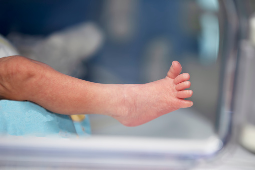 Little foot of a newborn baby. Neonatal medicine.