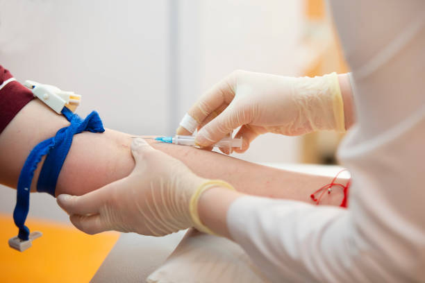 istock The doctor makes an injection into the patient's vein. 1409719058