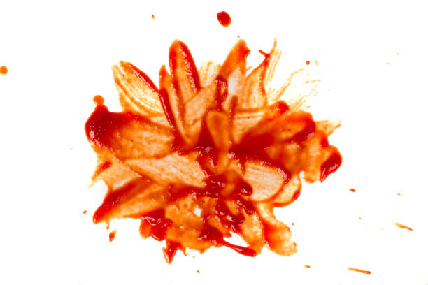 istock Red stain from ketchup smeared on a white background. 1409719251