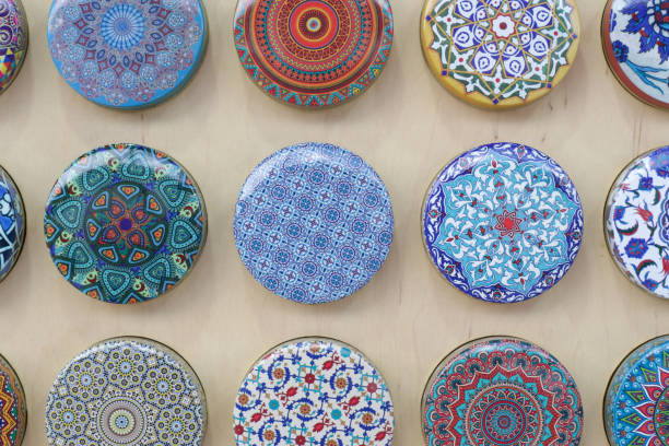 istock Display of decorative colorful souvenirs, magnets, tiles or boxes. 1409722729