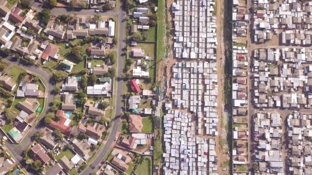 Aerial shot overhead township and wealthy houses in South Africa