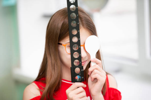 istock A little girl with visual impairment is being treated. 1409724371
