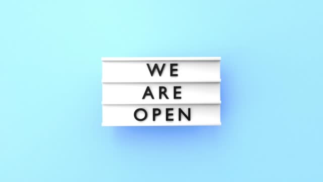 We Are Open Text is Displaying on a Lightbox on Blue Background in 4K Resolution