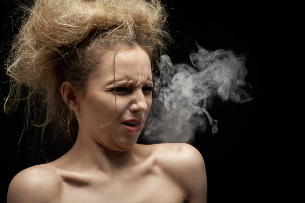 istock young woman coughs 1409728395
