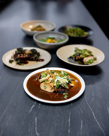 Group of dishes served at a restaurant - food and drink concepts