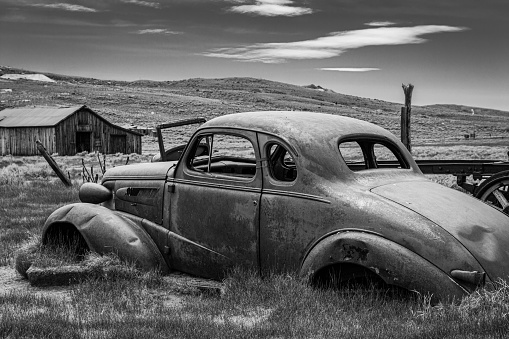 A 1937 Chevrolet coupe sits abandoned in Bodie ghost town.