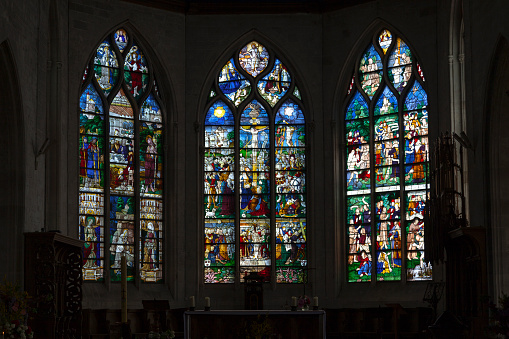 Stained glass windows in the Saint-Lô church, a 19th century Catholic church located in Bourg-Achard in Eure, Normandy.