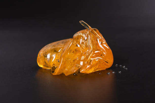 piece of cannabis wax clsoeup. concentrate dab with high thc stock photo