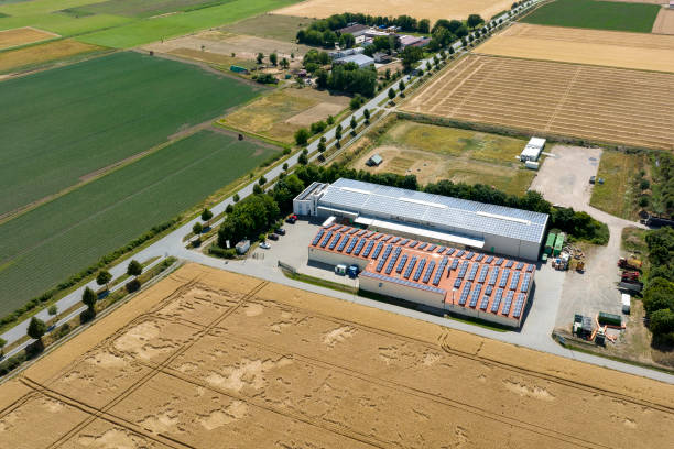 istock Agricultural farm and rooftoops - solar energy 1409745583