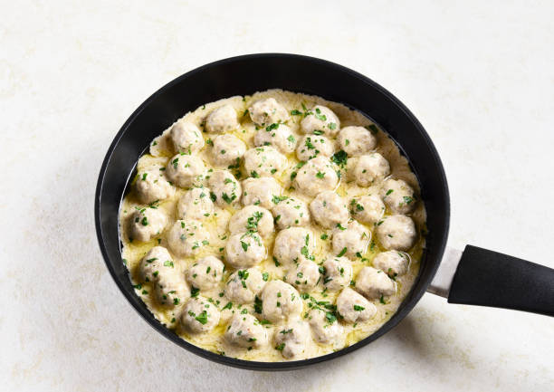 istock Swedish meatballs with white creamy sauce 1409745693