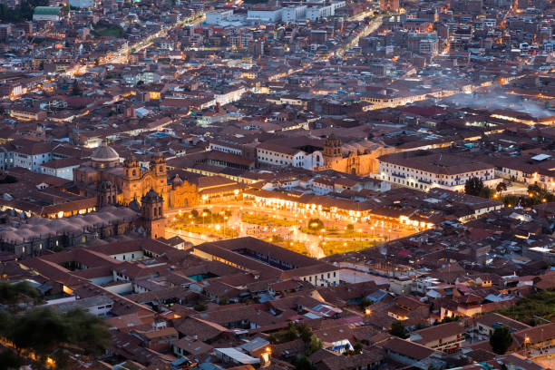 Aerial view of Plaza de Armas with Cathedral and church Iglesia Compania de Jesus Church, town square, Cusco, Peru.