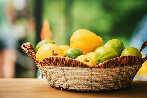Citrus fruits in the basket . Healthy snack
