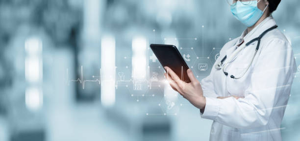 istock Doctor writes a medical history on a tablet . 1409749327