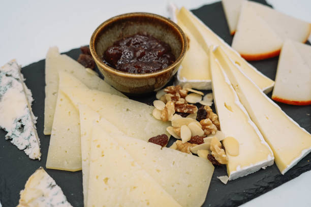 istock Table with different types of cheese to taste 1409750429