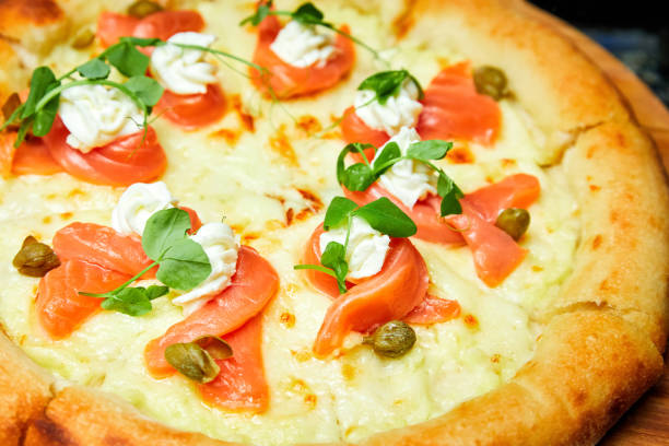 istock Pizza with salmon and cream cheese. Close-up, selective focus 1409755121