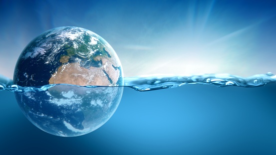 Planet earth submerged and floating in water. Concept 3D illustration of global warming and rising sea level in climate change due to man-made carbon emissions. Blue ocean Background and sinking globe.