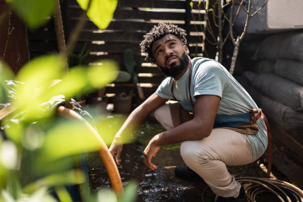istock Worried young man working at a garden center 1409764260