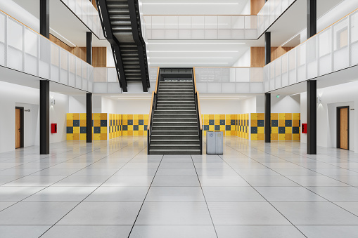 Empty School Corridor With Staircase, Closed Doors And Lockers