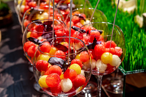 Fruits on banquet table shot during catering event. Holiday table setting