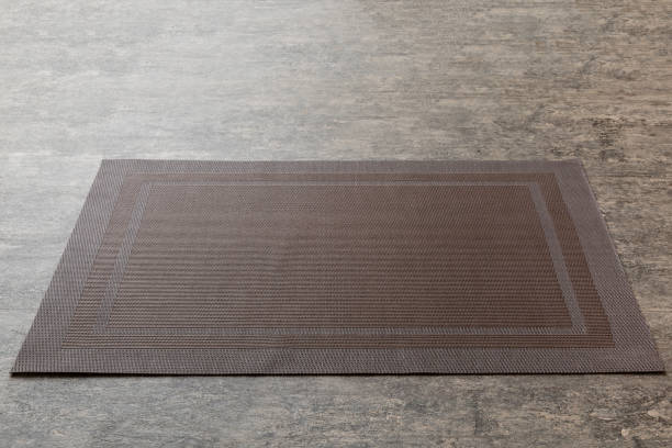 istock Perspective view of brown tablecloth for food on cement background. Empty space for your design 1409770162