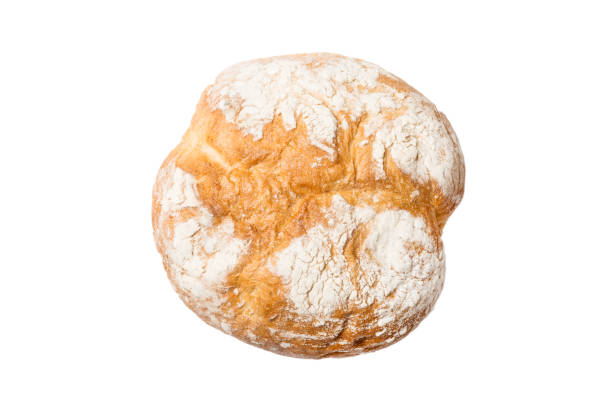 istock Bread top view cut out. Freshly backed Bread isolated on white background. Fresh organic loaf 1409770164