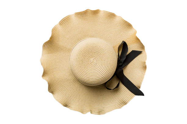 istock Womens summer yellow straw hat top view, isolated on white background 1409770204