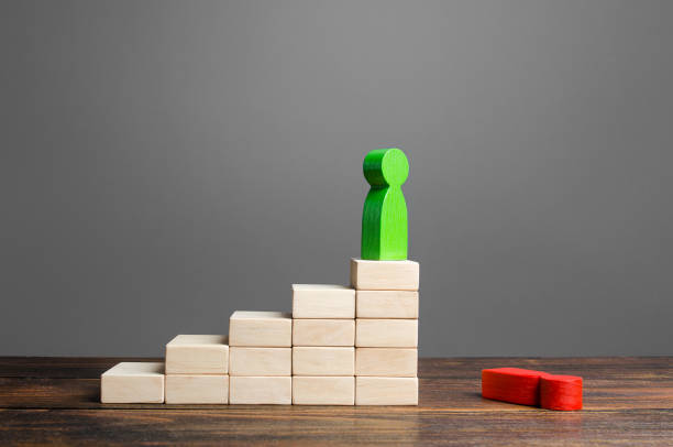 istock The new leader overthrew his opponent from his post. Head Offset. Business optimization, replacement of key employees with loyal ones. Power struggle. The strongest wins. Career ladder and success. 1409772567