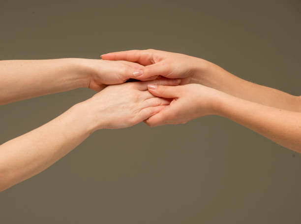 human hands on a white background isolated. hands indicate support hold care resist compete. stock photo