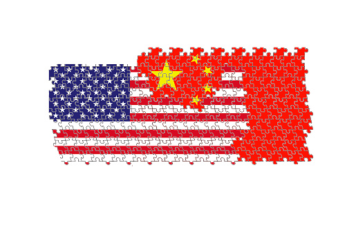 Jigsaw puzzle with the national flags of United States of America and China. International conflict and trade war concept.