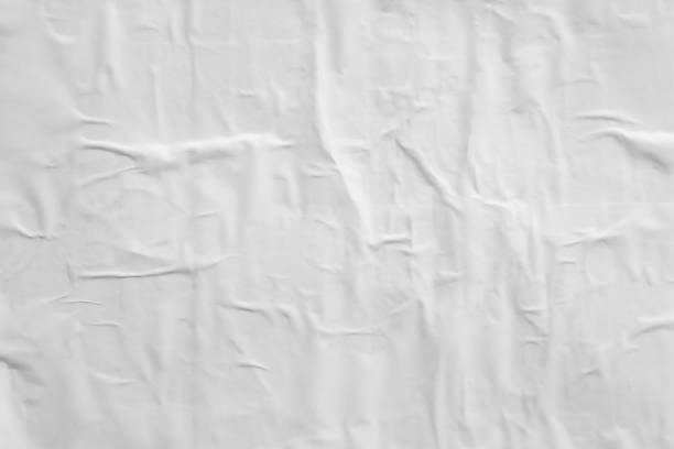 istock white crumpled and creased paper poster texture background 1409783813