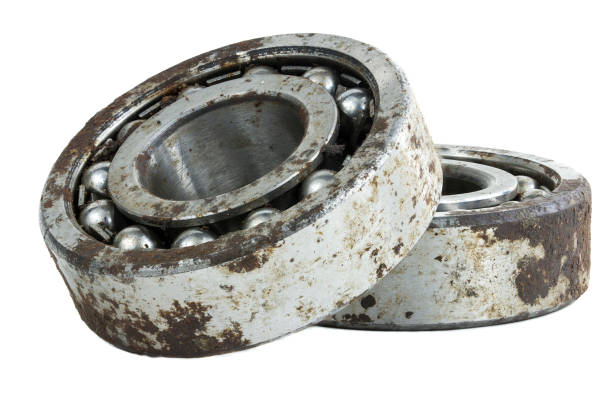 istock Bearing on a white background. Old worn bearing covered with rust 1409784016