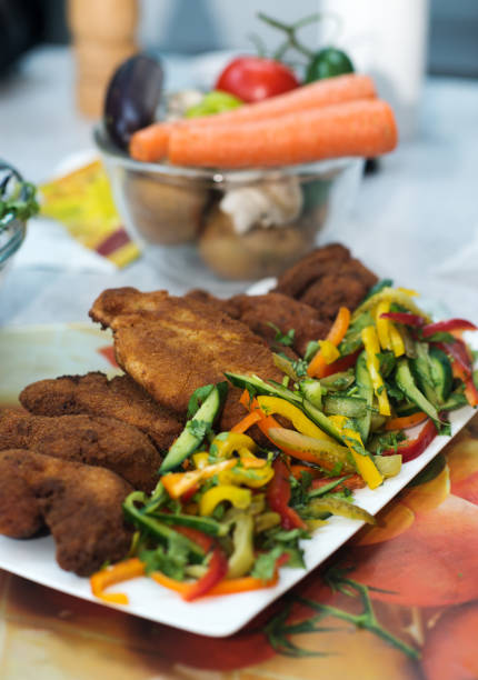 istock chicken breast deep fried in breadcrumbs 1409784446