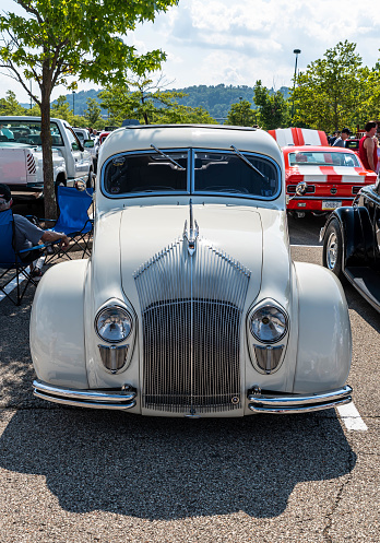 Homestead, Pennsylvania, USA July 19, 2022 An old white Chrysler sedan at the Homestead Waterfront car show associated with the Pittsburgh Grand Prix