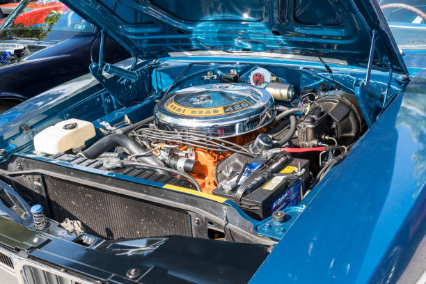 A blue Dodge Charger's motor and engine compartment at a car show in Homestead, Pennsylvania, USA Homestead, Pennsylvania, USA July 19, 2022 The engine compartment and motor of a blue Dodge Charger at the Homestead Waterfront  car show associated with the Pittsburgh Grand Prix dodge charger stock pictures, royalty-free photos & images