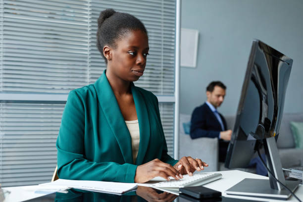 istock African businesswoman working on computer at office 1409790657