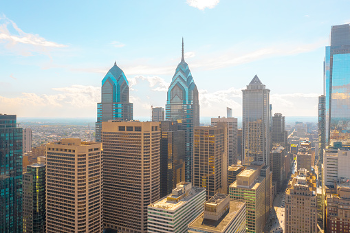 Bright and sunny summer afternoon of Philadelphia, Pennsylvania skyline buildings as seen from a drone point of view