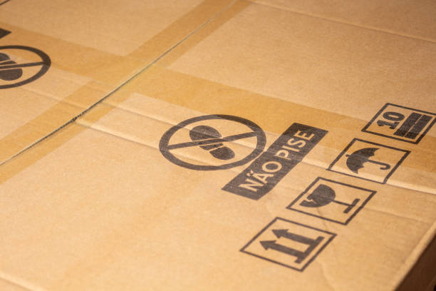 istock Cardboard box with care symbols, and description 