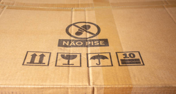istock Cardboard box with care symbols, and description 